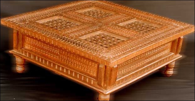 A beatifully carved himachali table