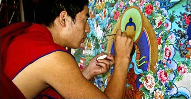 An artist making scroll painting