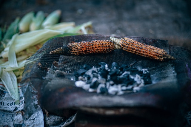 Corn (bhutta in Hindi) roasted on charcoal