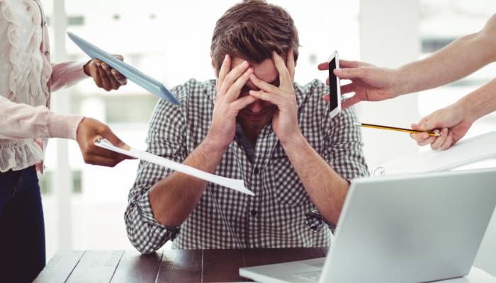 Overburdened Employee at Work: Ways to Reduce Stress and Achieve Work-Life Balance